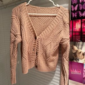 pink button sweater